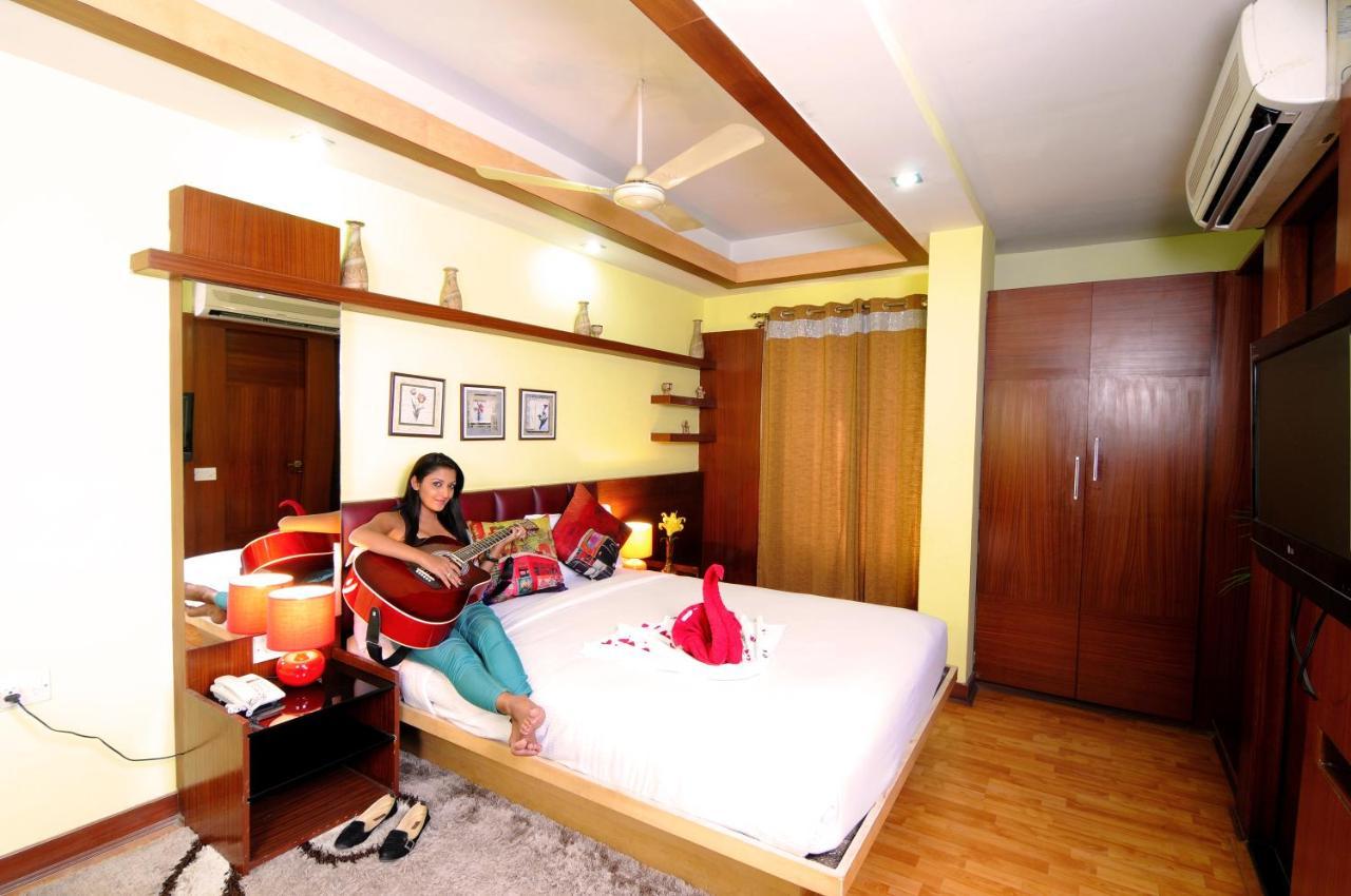 Capital O 3246 The Bouvice Hotel Bangalore Exterior photo
